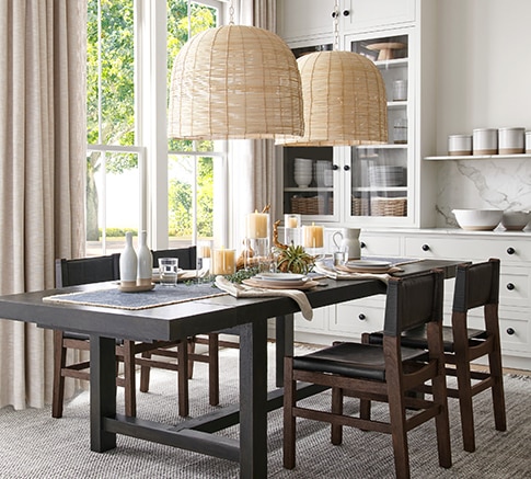 Pottery barn black dining table sale