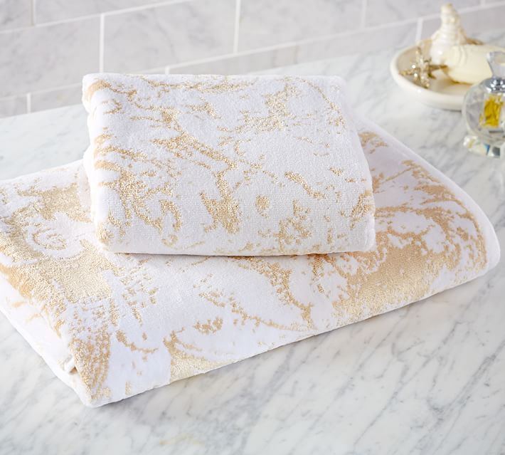 white and gold bath towels