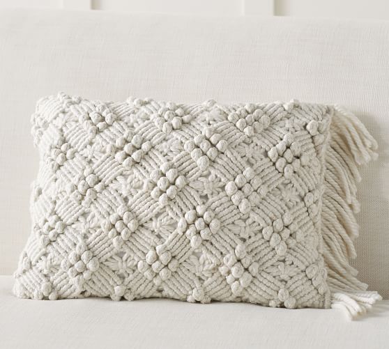 white macrame cushion