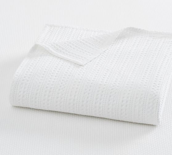 white cotton throw blanket