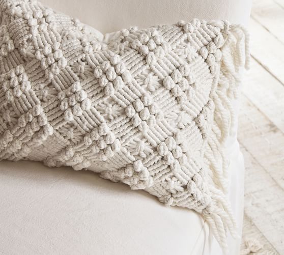 white macrame pillow