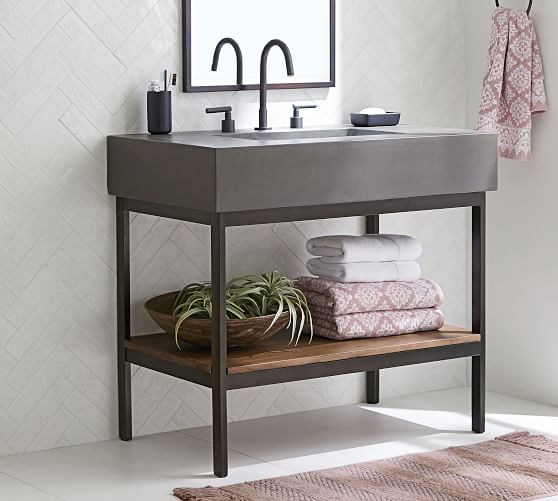 Concrete bathroom vanity with metal base and wood shelf
