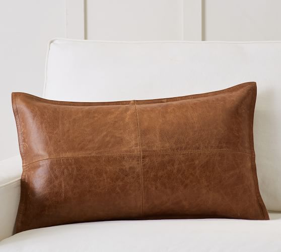 brown leather throw pillow