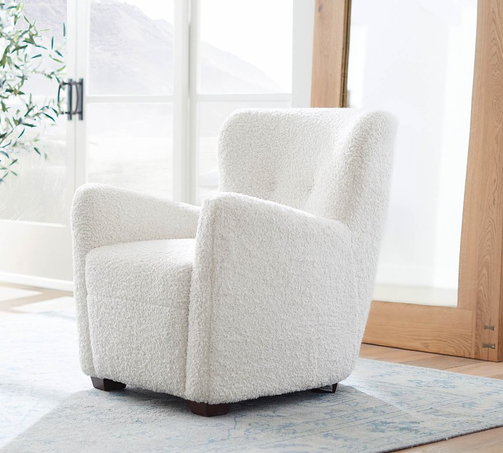 ivory upholstered armchair