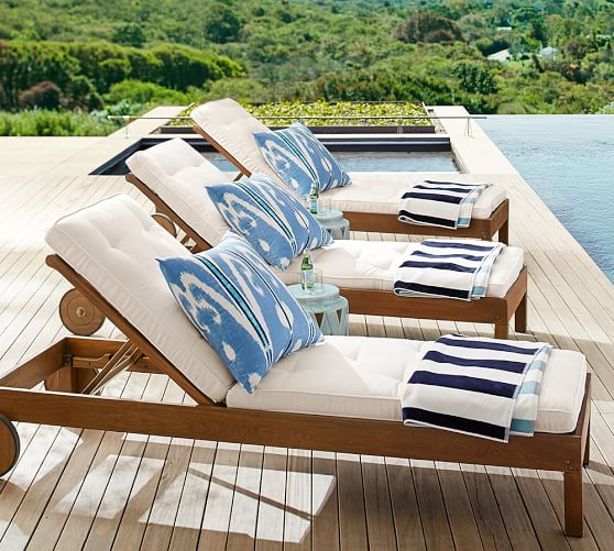 outdoor chaise lounge with wheels and cushion