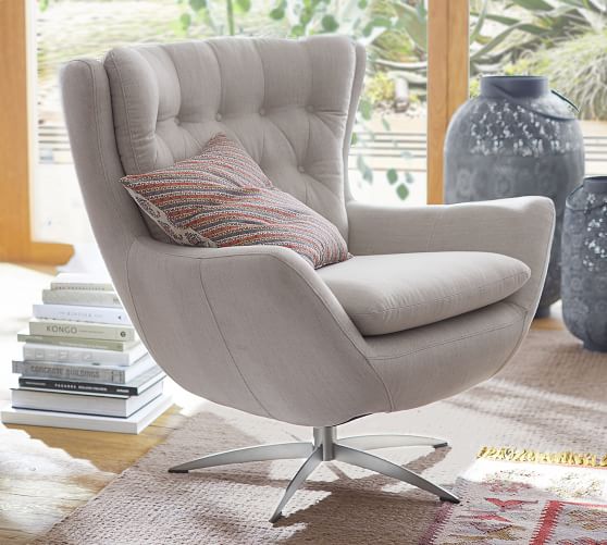 wells upholstered swivel armchair