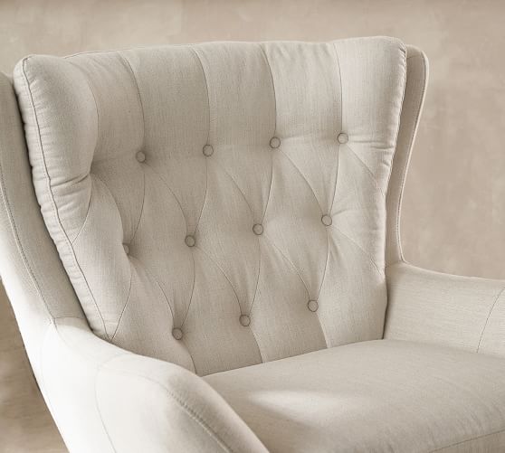 wells upholstered swivel armchair