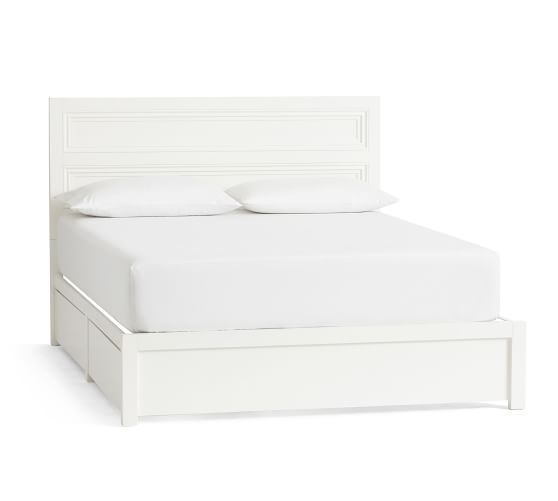 white bed with drawers full