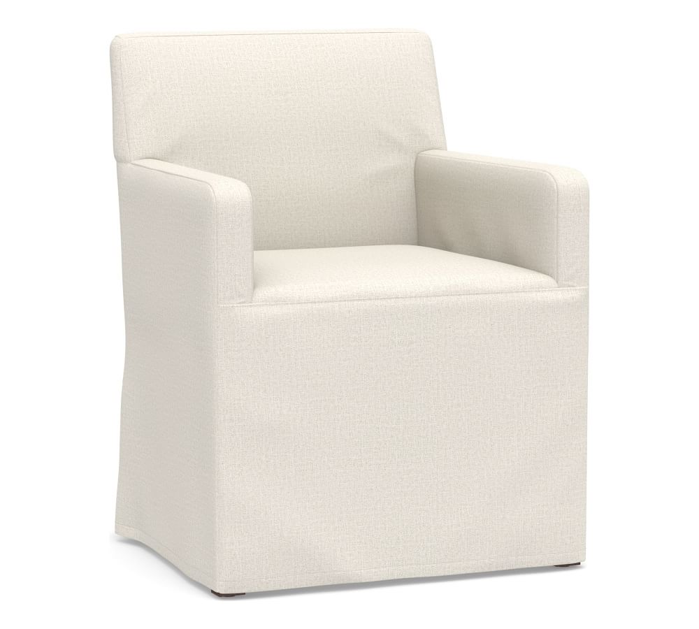 white slipcovered dining armchair