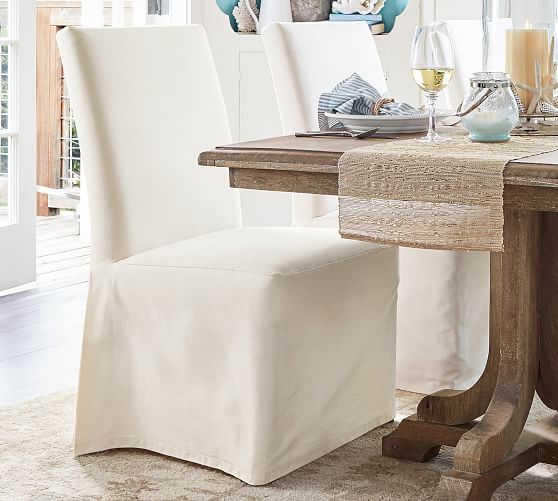 white linen slipcovered dining chair