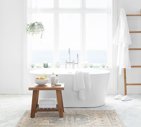 stool next to bathtub