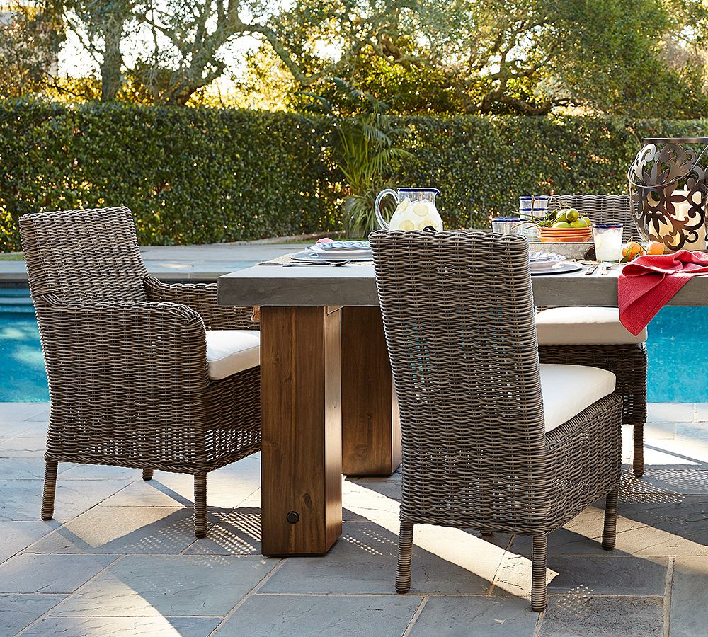 Huntington AllWeather Wicker Roll Arm Dining Chair Pottery Barn