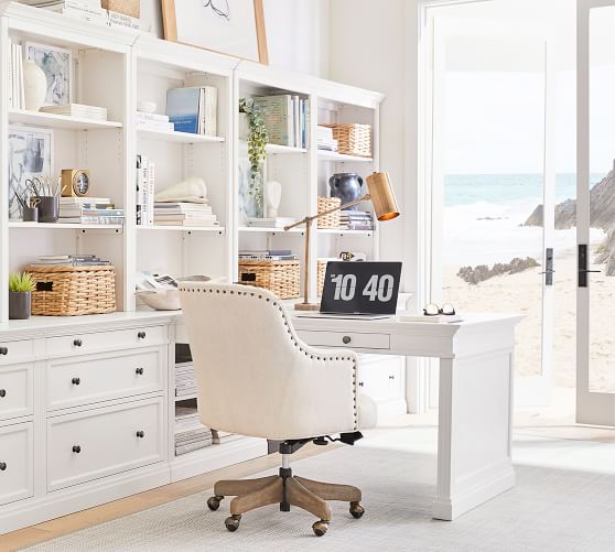 white peninsula desk with bookcase