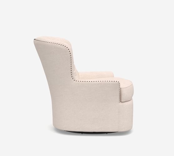 tufted linen swivel chair