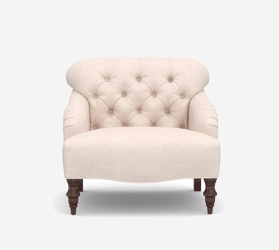 white upholstered armchair