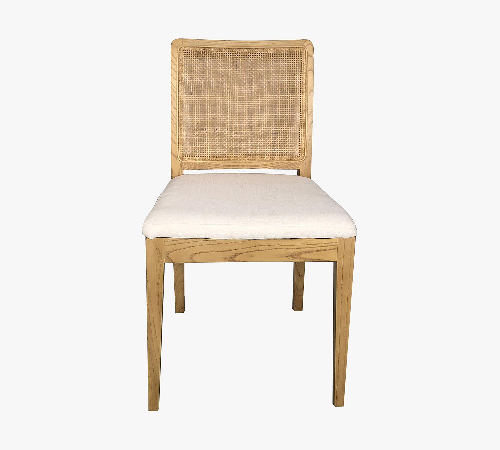 Axl Upholstered Cane Dining Chair Pottery Barn