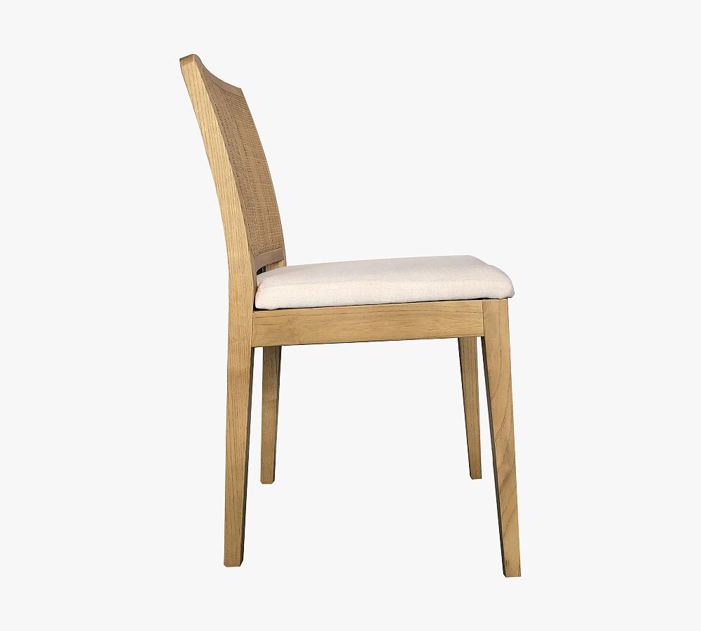 Axl Upholstered Cane Dining Chair Pottery Barn