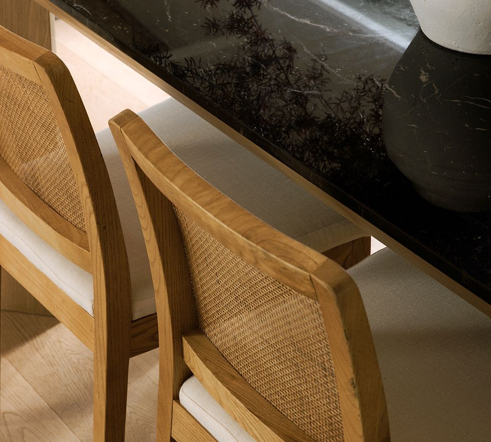 Axl Upholstered Cane Dining Chair Pottery Barn