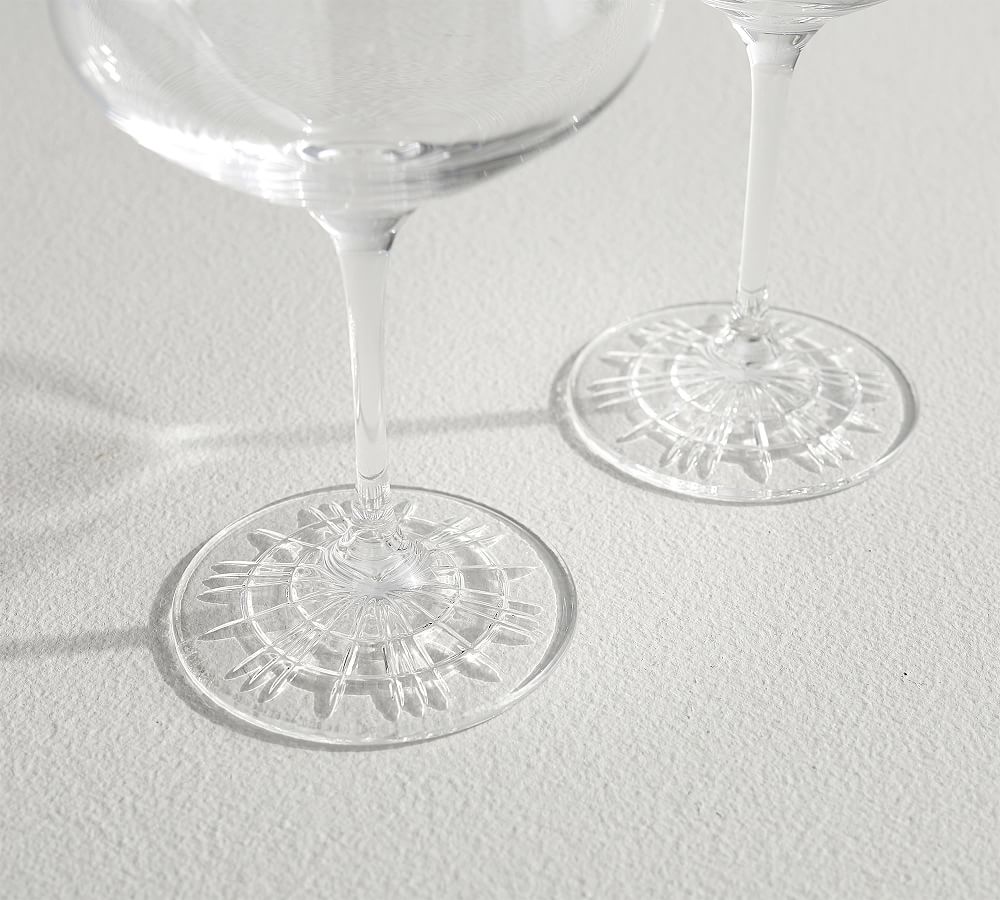 https://assets.pbimgs.com/pbimgs/ab/images/dp/wcm/202322/0206/monique-lhuillier-delphine-toasting-coupe-glasses-set-of-2-l.jpg