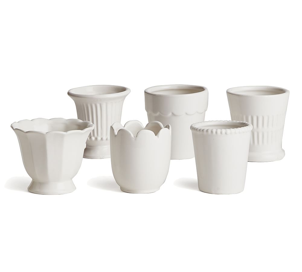 https://assets.pbimgs.com/pbimgs/ab/images/dp/wcm/202322/0230/assorted-mini-clay-cachepots-set-of-6-l.jpg