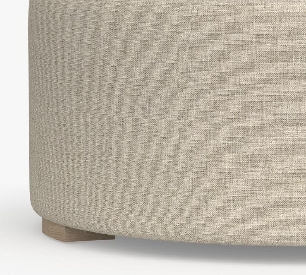 Universal Upholstered Round Ottoman | Pottery Barn