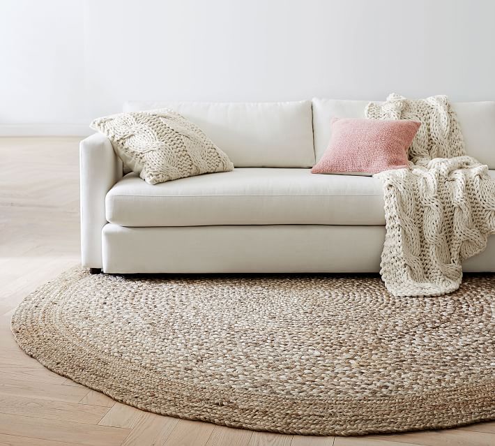 https://assets.pbimgs.com/pbimgs/ab/images/dp/wcm/202328/0036/border-round-braided-jute-rug-o.jpg