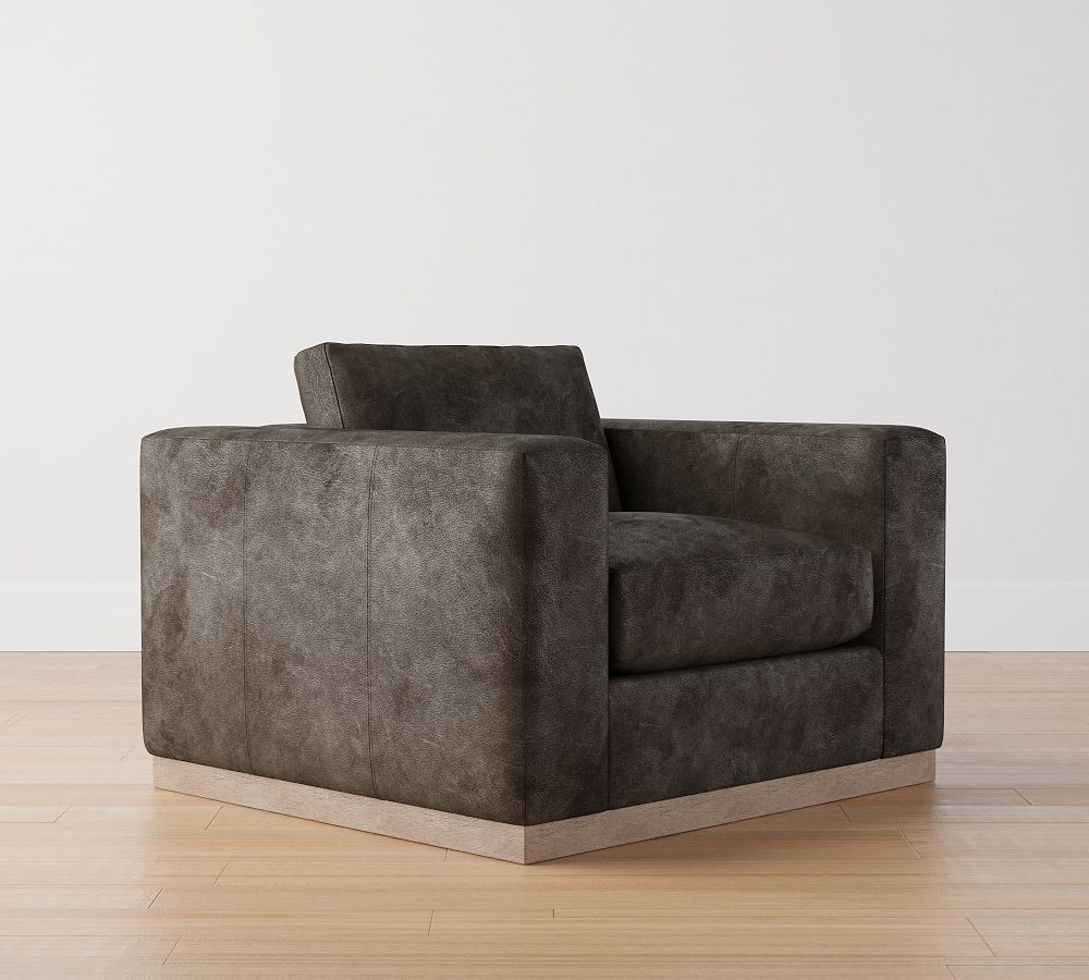 Leather armchair discount with wooden arms