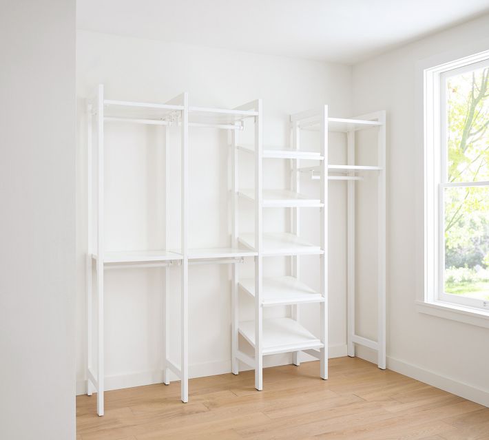 https://assets.pbimgs.com/pbimgs/ab/images/dp/wcm/202329/0014/essential-walk-in-closet-by-hold-everything-8-hanging-syst-1-o.jpg