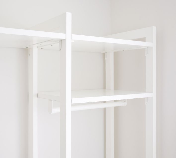 https://assets.pbimgs.com/pbimgs/ab/images/dp/wcm/202329/0014/essential-walk-in-closet-by-hold-everything-8-hanging-syst-o.jpg