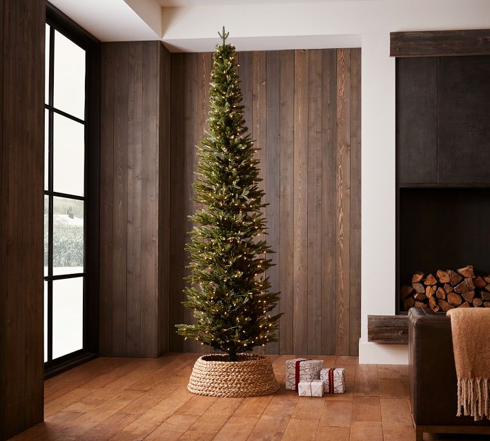 https://assets.pbimgs.com/pbimgs/ab/images/dp/wcm/202331/0163/pre-lit-narrow-lincoln-pine-faux-christmas-trees-o.jpg