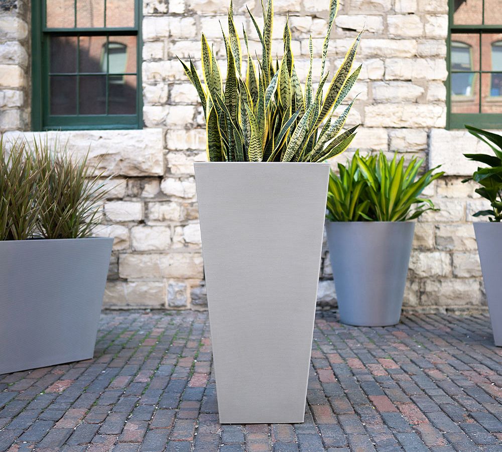 https://assets.pbimgs.com/pbimgs/ab/images/dp/wcm/202332/0100/lightweight-grooved-tapered-planter-l.jpg