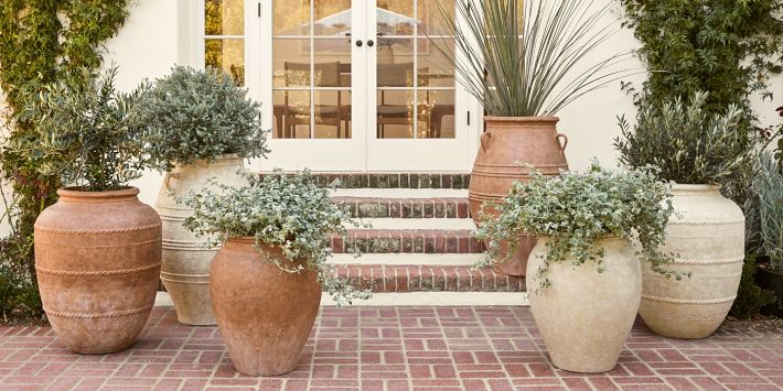 https://assets.pbimgs.com/pbimgs/ab/images/dp/wcm/202332/0104/sienna-fiber-stone-outdoor-planters-3-o.jpg