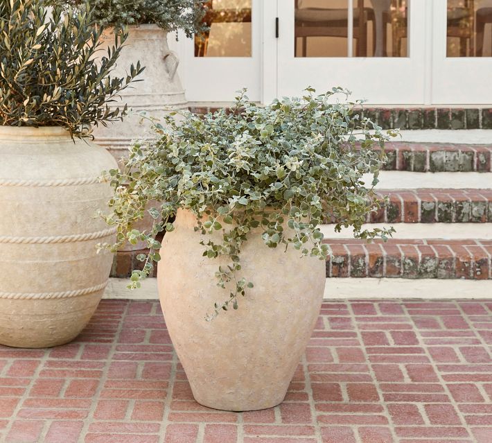 https://assets.pbimgs.com/pbimgs/ab/images/dp/wcm/202332/0104/sienna-fiber-stone-outdoor-planters-o.jpg