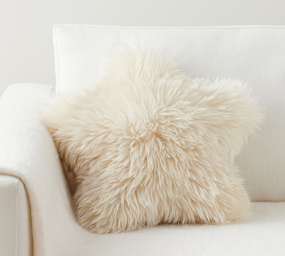 https://assets.pbimgs.com/pbimgs/ab/images/dp/wcm/202332/0105/luxe-faux-fur-star-shaped-throw-pillow-l.jpg