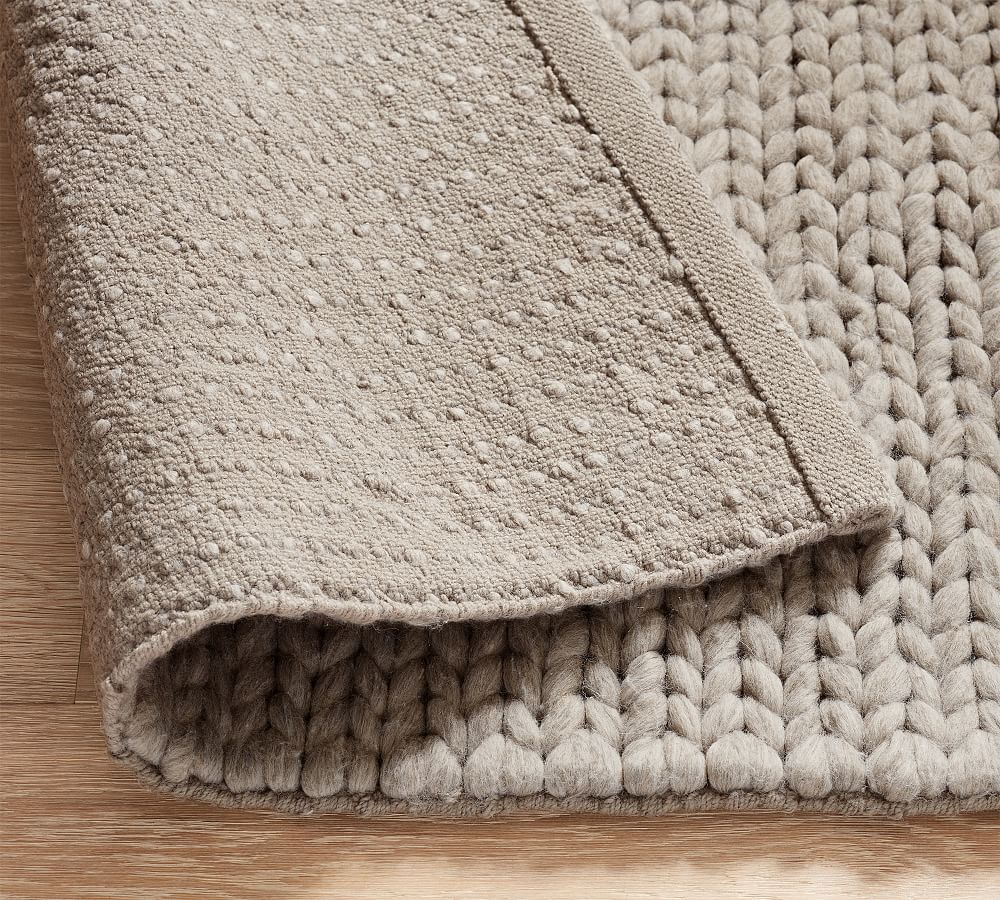 https://assets.pbimgs.com/pbimgs/ab/images/dp/wcm/202332/0869/chunky-knit-sweater-performance-outdoor-rug-l.jpg