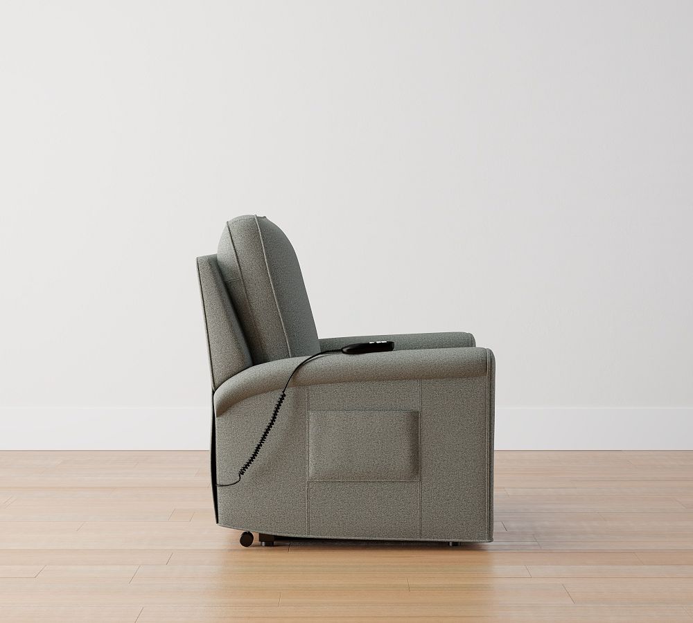 https://assets.pbimgs.com/pbimgs/ab/images/dp/wcm/202335/0549/tyler-roll-arm-upholstered-power-lift-recliner-4-l.jpg