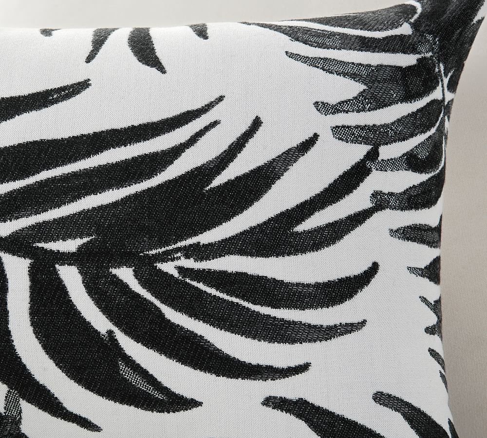 https://assets.pbimgs.com/pbimgs/ab/images/dp/wcm/202347/0175/sunbrella-black-palm-leaf-outdoor-lumbar-throw-pillow-l.jpg