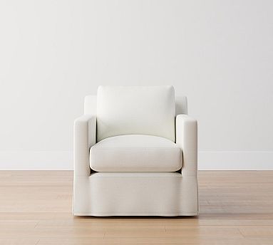 Slipcovered swivel deals armchair