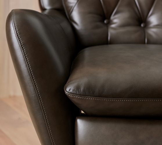 Wells tufted online leather swivel recliner