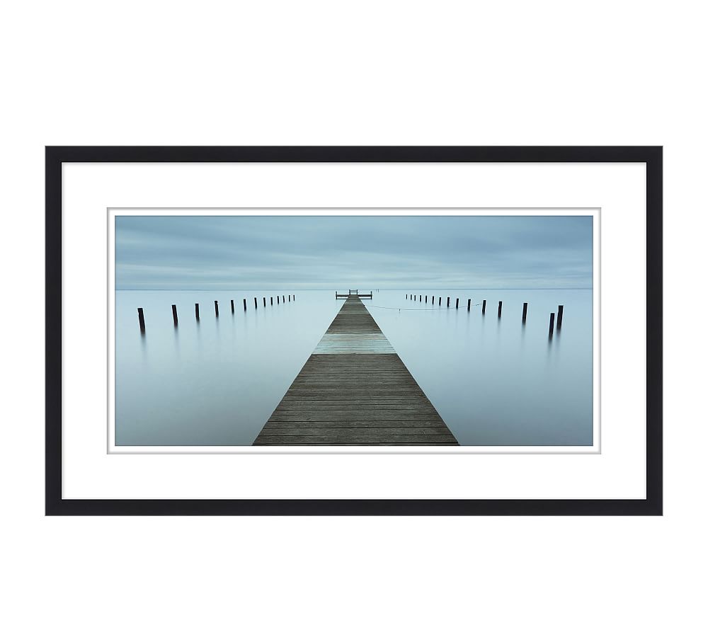 Pier Solitude Framed Print