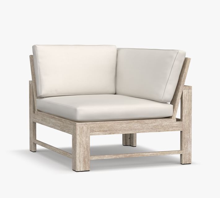 Two-seat sofa with light wood frame and cream cushions
