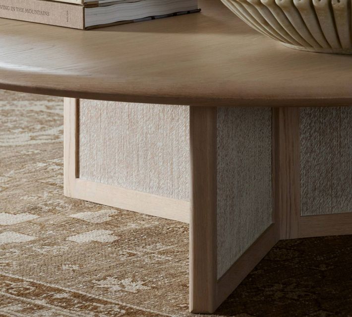 Close-up of table base panel and rug