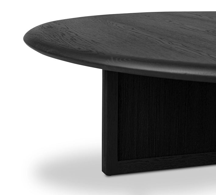 Dark wood round table with leg and partial surface