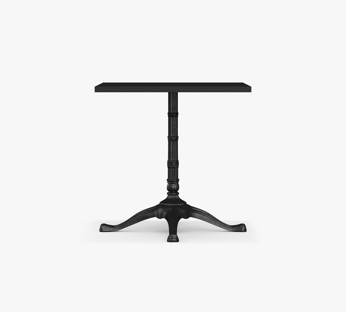 Close-up of a black pedestal base with a different tabletop surface