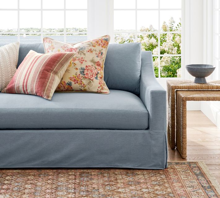 Close-up of light blue sofa fabric and weave.