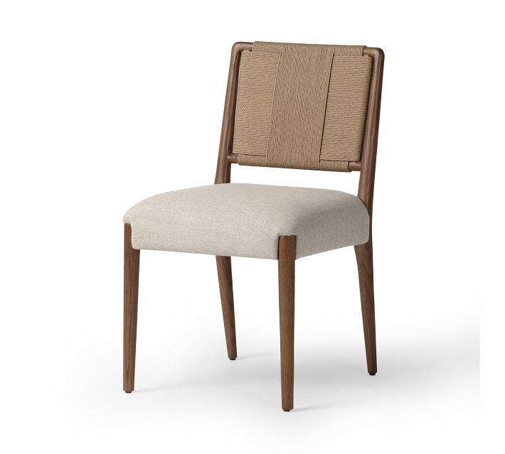 Single wooden dining chair with beige upholstered seat and natural woven backrest on white background