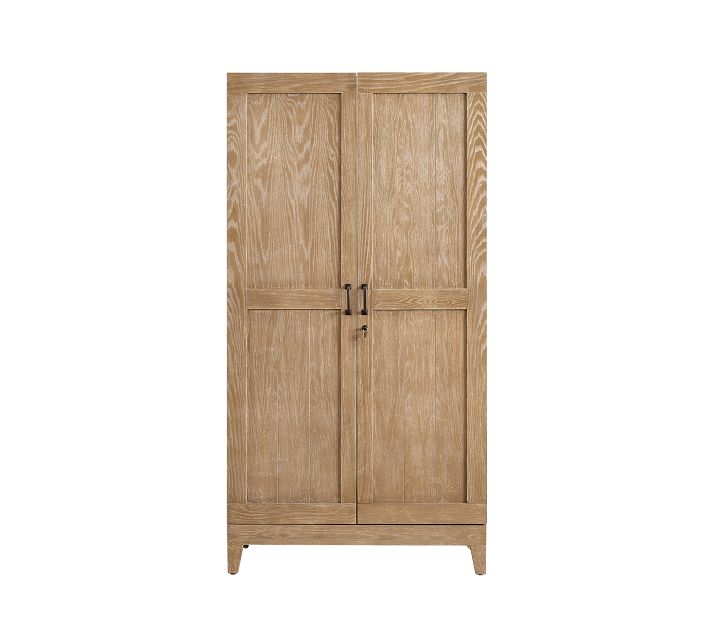 Tall light wood cabinet with two doors and metal handles on a white background.