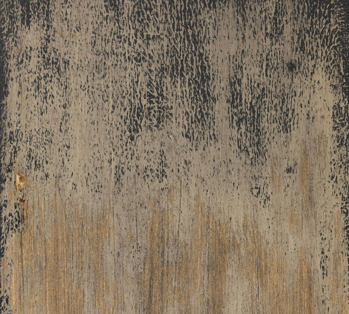 Texture of distressed wood close-up with black underlayer showing.
