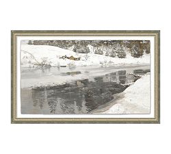 Snowy Riverbank Framed Print