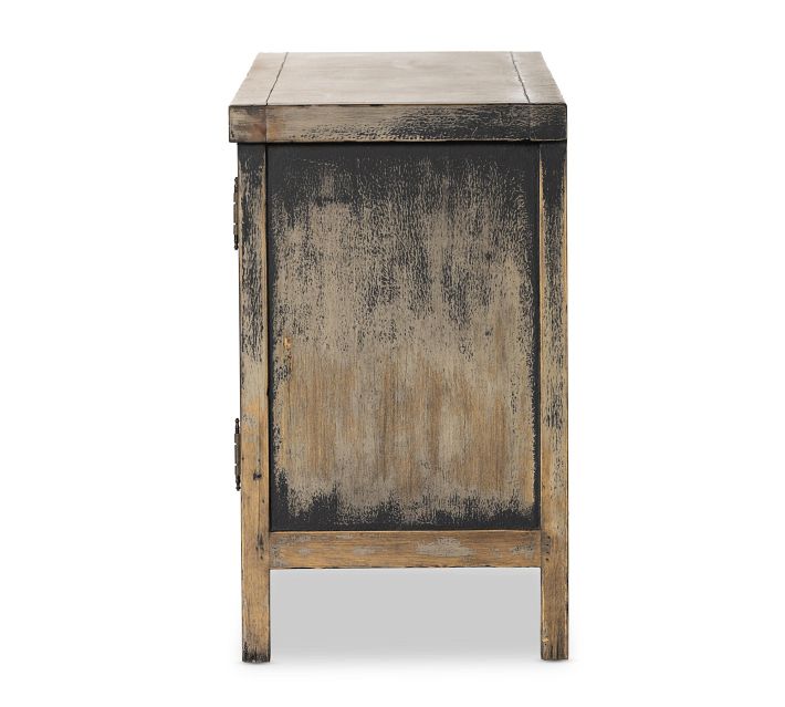 Back of the cabinet showing plain wood paneling and simple top.